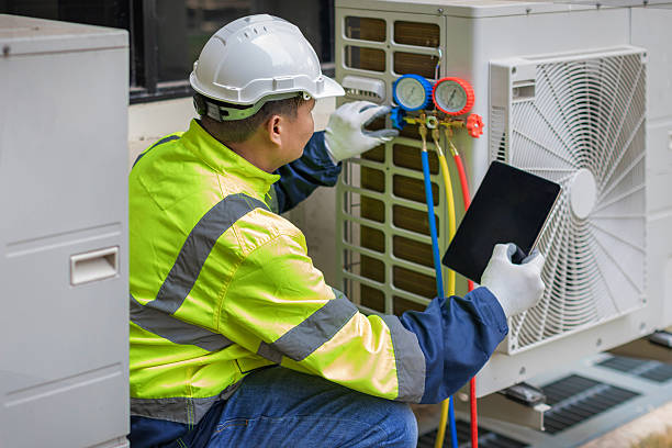 Professional Hvac technician working in Canton, MA